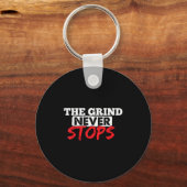 The Grind Never Stops Motivation Insrational Quote キーホルダー (正面)