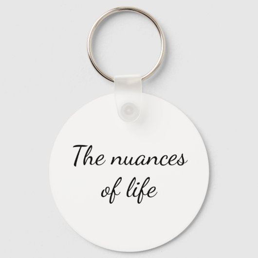 The nuances of life - be optimist キーホルダー (裏面)