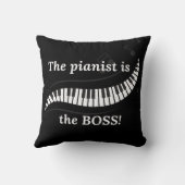 The pianist is the BOSS Pillow クッション (裏面)