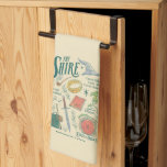 THE SHIRE™ Watercolor Collage Graphic キッチンタオル<br><div class="desc">Celebrate the simple comforts and grand adventures of The Shire™ with this charming Lord of the Rings™ collage design. Featuring a delightful collection of illustrated icons — including the One Ring, a Gandalf's hat and pipe, a well-packed travel rucksack, a trusty sword, a cozy hobbit door, and even a nod...</div>