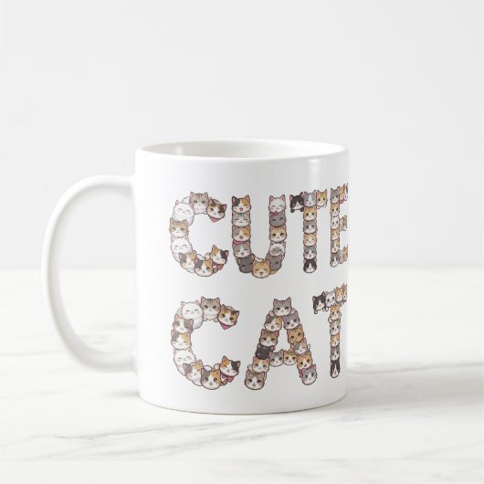 The words "CUTE CAT" are made using cat faces コーヒーマグカップ (左)