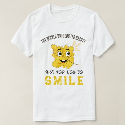 "The World Unfolds Its Beauty" Yellow Smiling Leaf Tシャツ (デザイン正面)
