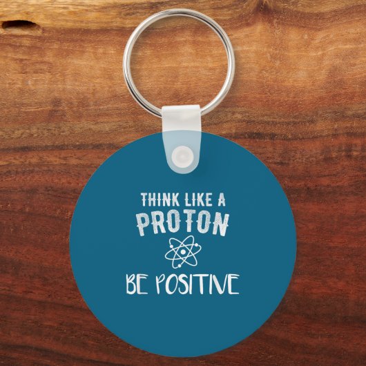 Think Like A Proton Be Sitive Funny Science Motiva キーホルダー (正面)
