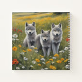 Three grey wolf pups waiting for mischief  ノートブック (裏面)