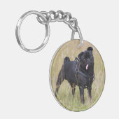 Toungeを突き出る黒いパグ キーホルダー (正面左)