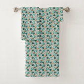 Towels with a teal floral pattern hang  バスタオルセット (インサイチュ)