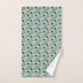 Towels with a teal floral pattern hang  バスタオルセット (ハンドタオル)