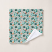 Towels with a teal floral pattern hang  バスタオルセット (ウォッシュタオル)