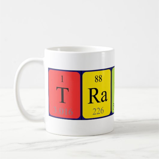 Travisの周期表の名前のマグ コーヒーマグカップ (左)