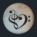 Treble Clef Bass Clef Heart Vintage Sheet Music マグネット<br><div class="desc">Treble clef and bass clef symbols are combined to form a musical heart, with soft blue and taupe vintage sheet music as a background. Easy way for classical musician, songwriter, bass player, artist, singer, composer to express love for music. Music lover magnet is a practical gift idea for a music...</div>