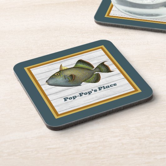 Triggerfishの深いティール（緑がかった色）金ゴールドとオレンジの名前 コースター (左側)