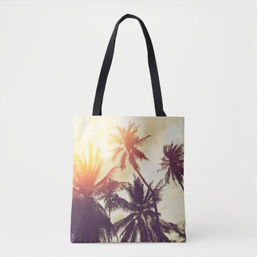 Tropical beach background with palm trees silhouet トートバッグ (正面)