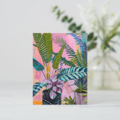 Tropical pink flamingos set against lush green ポストカード (スタンド正面)