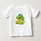 Turtle at Music with Headphone ベビーTシャツ (正面)