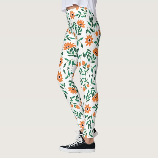 Two images of floral leggings showcase  レギンス (左)