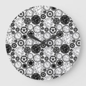 Two images show a round wall clock with a black ラージ壁時計 (正面)