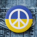 Ukrainian flag peace symbol Ukraine anti war 缶バッジ<br><div class="desc">Ukraine anti war button featuring a white peace symbol on a blue and yellow ukranian flag background.</div>