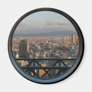 Umedaの空の建物からの大阪日本の眺め マグネット