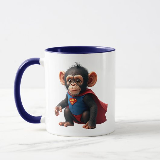 Un bébé singe super-héros avec sa cape. マグカップ (左)