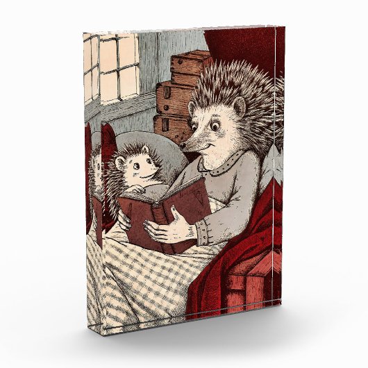 Un hérisson dans une couverture lisant un livre à  フォトブロック (左)