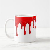 Un liquide rouge vif coule le long d'un mug blanc. コーヒーマグカップ (左)