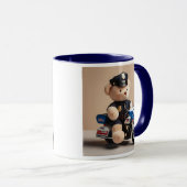 Un ours policier en peluche. マグカップ (正面右)