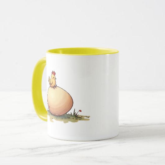 Un poussin couve un œuf. マグカップ (正面左)