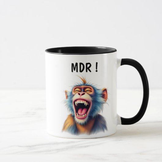 Un singe rigolo mort de rire. マグカップ (右)