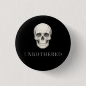 UNBOTHERED | ひび割れた静かなドクロの美学 缶バッジ (正面)