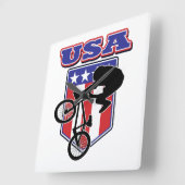 USA-BMXバイクもしくは自転車に乗る人 スクエア壁時計 (傾斜)