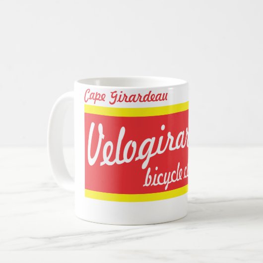 Velogirardeauのマグ コーヒーマグカップ (正面左)
