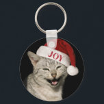 Very Santa おもしろい Cat Laugh Photo Christmas キーホルダー<br><div class="desc">サンタ猫の笑い写真クリスマスキーチェーンとおもしろい一緒にミオイなクリスマスの応援を広げる！あなたは自分を扱うか仲間の猫好きを驚かすかこの可愛いアクセサリーは必ずあなたの顔にスマイルをもたらす。サンタおもしろいハットの子猫の写真はあなたのクリスマスの装飾にwhimsyのtouchを追加し、良い笑いを鑑賞する人のためにパーフェクトな贈り物を作る。</div>