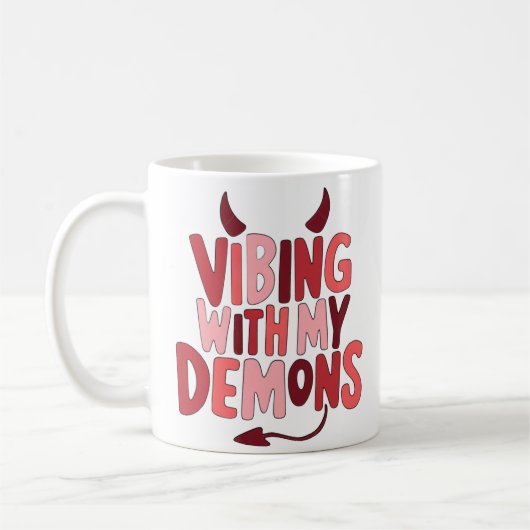 Vibing with My Demons コーヒーマグカップ (左)