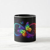 Vibrant infinity with rainbow butterfly on black マグカップ (中央)
