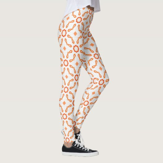 Vibrant Orange-Red Floral & Bow Pattern Leggings レギンス (右)