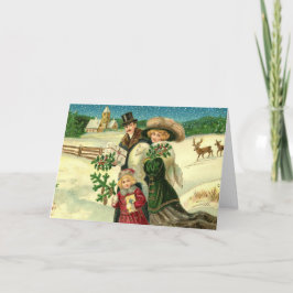 Victorian family in the snow Christmas scene カード
