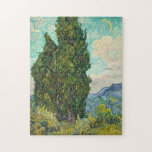 Vincent Van Gogh Cypresses ジグソーパズル<br><div class="desc">Beautiful vintage artwork famous impressionist painter Vincent Van Gogh. This impressionism art features cypress trees in a field in front of swirling clouds and a moon in the sky. The teals,  yellows,  and greens make a lovely puzzle.</div>