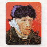 Vincent Van Gogh - Self Portrait With Bandaged Ear マウスパッド<br><div class="desc">Oil on canvas from 1889, this self portrait showing Van Gogh's bandaged ear and deeply sad eyes, was painted a month after his breakdown in December 1888 when he cut off his own earlobe with a razor following an argument with his roomate, Paul Gauguin. Unlike similar stores, Art Lover's Cafe...</div>