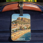 Vintage Alicante Spain Vacation Travel ラゲッジタグ<br><div class="desc">Bring the timeless sun-drenched charm of the Costa Blanca into your home! This premium vintage-style travel Luggage Tag captures the soul of Alicante, Spain, through a classic mid-century lens. The artwork masterfully balances the relaxation of the Mediterranean with the city’s deep history. In the foreground, the golden sands of Playa...</div>