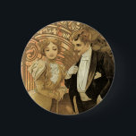 Vintage Art Nouveau Love Romance, Flirt by Mucha 缶バッジ<br><div class="desc">Vintage illustration french Art Nouveau advertising poster design for Flirt Biscuits by Alphons Mucha. c. 1899. This love and romance advertisement design features a newlywed bride and groom couple flirting. The woman is in an elegant Victorian wedding gown and the man is in a dapper, fancy tuxedo. Getting married after...</div>