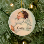 Vintage Baby Girl Angel Sleeping セラミックオーナメント<br><div class="desc">Beautiful vintage image of a baby girl angel sleeping on a cloud by artist Charlot Byi. Credit: Prints available at artprintsanddecor.com</div>