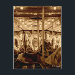 Vintage Carousel ポストカード<br><div class="desc">Go 'round and 'round on this vintage carousel,  or merry-go-round,  photographed in sepia tones. A great reminder of childhood.</div>