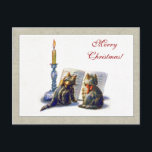 Vintage Cats Christmas Postcard シーズンポストカード<br><div class="desc">Send friends,  family,  or clients wishes for a Merry Christmas with this postcard. The card features a cute vintage image of Victorian cans,  dressed in Christmas bows to celebrate the holiday. A thoughtful idea that anyone is sure to love!</div>