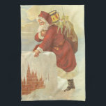 Vintage Christmas ビクトリアン Santa Claus in Chimney キッチンタオル<br><div class="desc">ヴィンテージイラストレーションビクトリアンエラメリークリスマスの休日デザインは、クリスマスイブのおもちゃでいっぱいの袋で雪の上の屋根の登山の上にサンタクロースをフィーチャー。屋根の上に聖ニコライすてきルと非常に寒い冬の夕べ。</div>