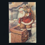 Vintage Christmas ビクトリアン Santa Claus in Chimney キッチンタオル<br><div class="desc">ヴィンテージのイラストレーションビクトリアンメリークリスマスの休日の画像すてきは、クリスマス・イブに玩具の袋でいっぱいの家の煙突の下に白い髭と帽子の登山を持つ古いサンタ・クロースを特徴とする。ハッピーホリデーと季節のご挨拶！</div>