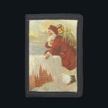 Vintage Christmas ビクトリアン Santa Claus in Chimney ナイロン三つ折りウォレット<br><div class="desc">ヴィンテージイラストレーションビクトリアンエラメリークリスマスの休日デザインは、クリスマスイブのおもちゃでいっぱいの袋で雪の上の屋根の登山の上にサンタクロースをフィーチャー。屋根の上に聖ニコライすてきルと非常に寒い冬の夕べ。</div>