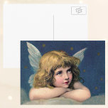 Vintage Christmas, Beautiful Angel with Gold Stars シーズンポストカード<br><div class="desc">Vintage illustration Victorian Christmas holiday image featuring a beautiful angel resting on a cloud in heaven. Blue skies with golden stars surround her.</div>