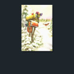 Vintage Christmas, Mailboxes in Winter Landscape キャンバスプリント<br><div class="desc">ヴィンテージイラストレーションビクトリアンエラメリークリスマスの休日の画像は、雪の上にクリスマスのメールと冬のプレゼントで満たされたメールボックスの雪の風景を特徴とする。馬描車が雪の通りを横に木々と森で走っている。ハッピーホリデーと季節のご挨拶！</div>