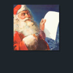 Vintage Christmas, Santa Claus いけな Nice List キャンバスプリント<br><div class="desc">ヴィンテージイラストレーションメリークリスマスの休日の画像すてきは、サンタクロースが赤い帽子を被り、クリスマスイブに彼のいけなまたは素敵なリストをチェックする。</div>