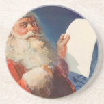 Vintage Christmas, Santa Claus いけな Nice List コースター<br><div class="desc">ヴィンテージイラストレーションメリークリスマスの休日の画像すてきは、サンタクロースが赤い帽子を被り、クリスマスイブに彼のいけなまたは素敵なリストをチェックする。</div>